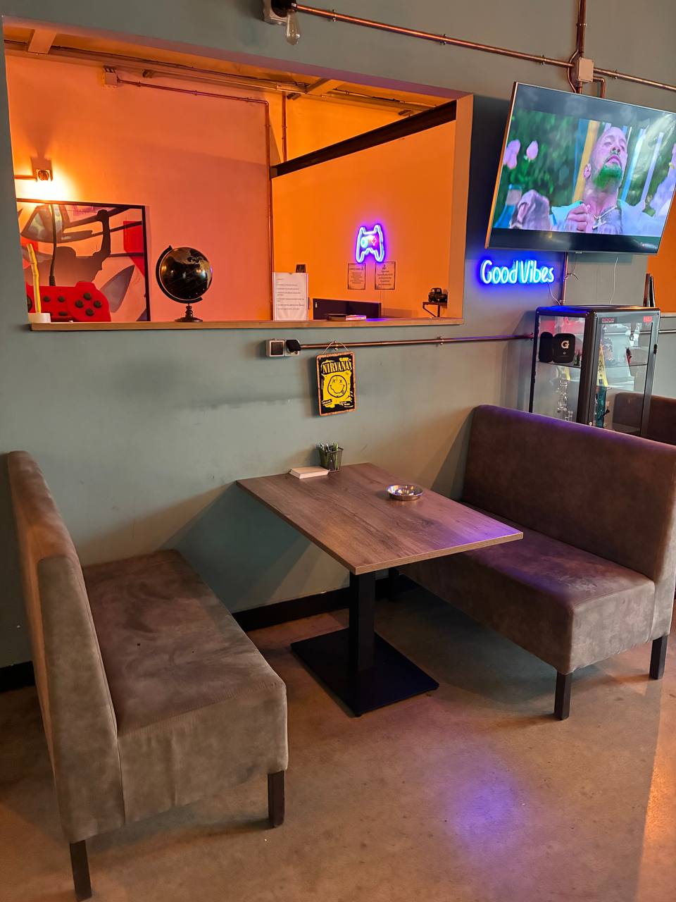 Soft booths and low light for the nights you would rather just talk.
