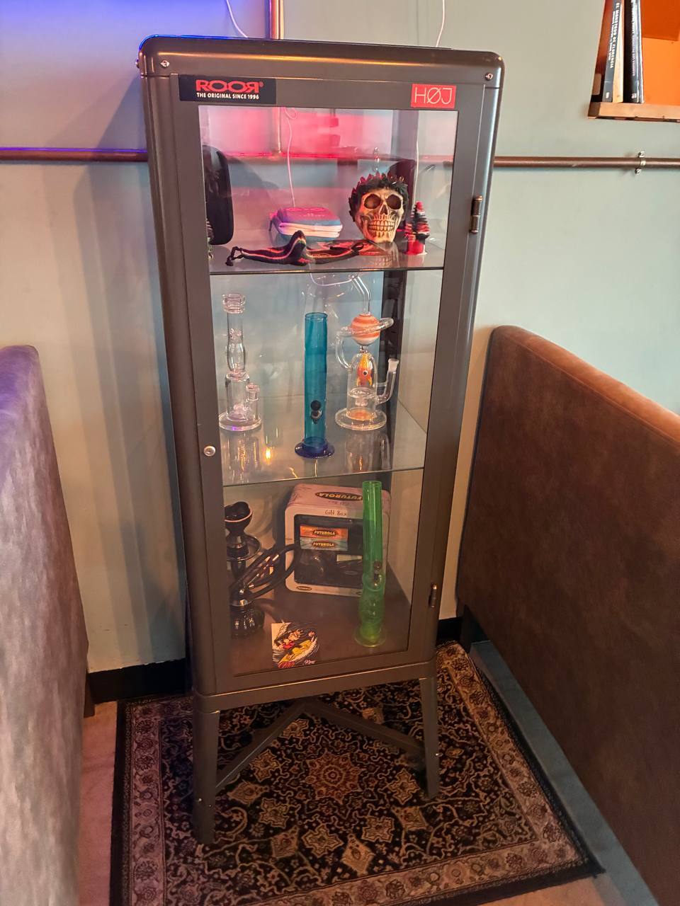 The glass cabinet: bongs, pipes and the good pieces.